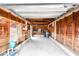 Interior of a garage with wooden walls and storage shelves at 440 77Th Ave, St Pete Beach, FL 33706