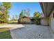 House exterior with stone accents and a circular driveway at 5474 Kemkerry Rd, Wesley Chapel, FL 33543