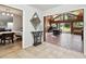Bright sunroom with tile flooring and plenty of natural light at 5474 Kemkerry Rd, Wesley Chapel, FL 33543