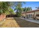 Spacious backyard with patio and fenced yard at 587 Hillcrest Dr, Largo, FL 33771
