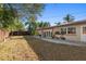 Large backyard with patio and fenced yard at 587 Hillcrest Dr, Largo, FL 33771