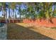 Spacious backyard with patio and fenced yard at 587 Hillcrest Dr, Largo, FL 33771
