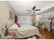 Main bedroom with hardwood floors and ceiling fan at 587 Hillcrest Dr, Largo, FL 33771