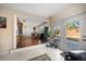 Living room with access to backyard and views of patio at 587 Hillcrest Dr, Largo, FL 33771