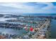 Aerial view of canal front home and neighborhood at 635 115Th Ave, Treasure Island, FL 33706