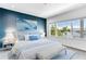 Bright bedroom with water views and stylish decor at 635 115Th Ave, Treasure Island, FL 33706