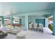 Covered patio furnished for dining and lounging at 635 115Th Ave, Treasure Island, FL 33706