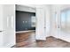 Bright entryway with wood-look flooring and French doors at 635 115Th Ave, Treasure Island, FL 33706
