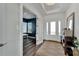 Elegant entryway with view of home office and hardwood floors at 635 115Th Ave, Treasure Island, FL 33706