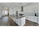 Modern kitchen with stainless steel appliances and granite countertops at 635 115Th Ave, Treasure Island, FL 33706