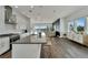 Modern kitchen with island and water views at 635 115Th Ave, Treasure Island, FL 33706
