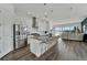 Modern kitchen with island and water views at 635 115Th Ave, Treasure Island, FL 33706