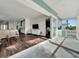 Open living space with water view and access to balcony at 635 115Th Ave, Treasure Island, FL 33706