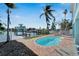 Inviting kidney-shaped pool with canal views at 635 115Th Ave, Treasure Island, FL 33706