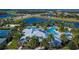 Resort-style community pool, tennis courts, and playground at 6650 Current Dr, Apollo Beach, FL 33572