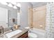 Bathroom with single vanity and a shower/tub combo at 6650 Current Dr, Apollo Beach, FL 33572
