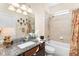 Bathroom with single vanity and a shower/tub combo at 6650 Current Dr, Apollo Beach, FL 33572