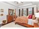 Main bedroom with large windows and ample closet space at 6650 Current Dr, Apollo Beach, FL 33572