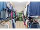 Large walk-in closet with ample hanging and shelf space at 6650 Current Dr, Apollo Beach, FL 33572