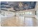 Bright and airy common area with high ceilings and unique lighting at 6650 Current Dr, Apollo Beach, FL 33572