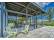 Covered patio with seating, perfect for relaxing at 6650 Current Dr, Apollo Beach, FL 33572