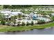 Resort-style community pool with clubhouse and water slide at 6650 Current Dr, Apollo Beach, FL 33572