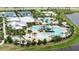 Resort-style pool with water slide, tennis courts, and expansive sundeck at 6650 Current Dr, Apollo Beach, FL 33572