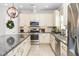 Spacious kitchen with granite counters, stainless steel appliances, and ample cabinetry at 6650 Current Dr, Apollo Beach, FL 33572