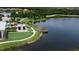 Aerial view of community lake with walking path and dock at 6650 Current Dr, Apollo Beach, FL 33572