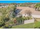 Aerial view showcasing the home's private backyard oasis and surrounding landscape at 1000 Chillum Ct, Safety Harbor, FL 34695