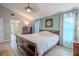 Bright bedroom with ensuite bathroom and ample closet space at 1000 Chillum Ct, Safety Harbor, FL 34695
