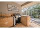 Outdoor kitchen with grill and sink, perfect for entertaining at 1000 Chillum Ct, Safety Harbor, FL 34695
