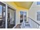 Bright balcony with sliding glass doors and ocean view at 12000 Gulf Blvd # 309N, Treasure Island, FL 33706