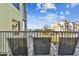 Spacious balcony with ocean view and comfortable seating at 12000 Gulf Blvd # 309N, Treasure Island, FL 33706
