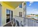 Balcony with sliding glass doors and ocean view at 12000 Gulf Blvd # 309N, Treasure Island, FL 33706