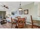 Small dining area with round table and four chairs at 12000 Gulf Blvd # 309N, Treasure Island, FL 33706