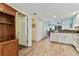 View of kitchen, hallway, and part of a bedroom at 12000 Gulf Blvd # 309N, Treasure Island, FL 33706
