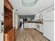 Bright kitchen with white cabinets and appliances, offering an open feel at 12000 Gulf Blvd # 309N, Treasure Island, FL 33706