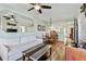 Open living space with sofa, coffee table, and kitchen view at 12000 Gulf Blvd # 309N, Treasure Island, FL 33706