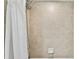 Shower with tile surround and white shower curtain at 12000 Gulf Blvd # 309N, Treasure Island, FL 33706