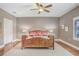 Bright bedroom with hardwood floors and ceiling fan at 1340 Bayshore Blvd # 407, Dunedin, FL 34698