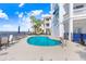 Inviting kidney-shaped pool with ample lounge space at 1340 Bayshore Blvd # 407, Dunedin, FL 34698
