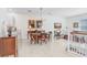 Elegant dining room featuring a large table and chandelier at 1340 Bayshore Blvd # 407, Dunedin, FL 34698