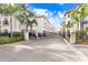 Community entrance with gated access and lush landscaping at 1340 Bayshore Blvd # 407, Dunedin, FL 34698