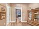 Elegant hallway with built-in bookcase and office view at 1340 Bayshore Blvd # 407, Dunedin, FL 34698