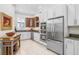 Modern kitchen with stainless steel appliances and granite countertops at 1340 Bayshore Blvd # 407, Dunedin, FL 34698