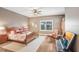 Spacious main bedroom with hardwood floors and a sitting area at 1340 Bayshore Blvd # 407, Dunedin, FL 34698