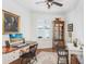 Home office with built-in shelving and hardwood floors at 1340 Bayshore Blvd # 407, Dunedin, FL 34698