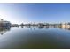 Stunning view of waterfront homes and boats on a sunny day at 17408 1St E St, Redington Shores, FL 33708