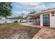 Brick patio, grassy yard, and access to home at 2790 Pinellas Point S Dr, St Petersburg, FL 33712